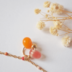 Bracelet Paulette perle en verre filé bijoux artisanaux orange et rose