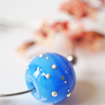 boucles d'oreilles créoles collier galaxie perles en verre filé argent bijoux